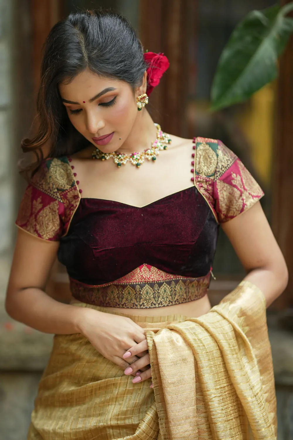 Burgundy velvet and banarasi brocade sweetheart neck blouse with potli button detailing