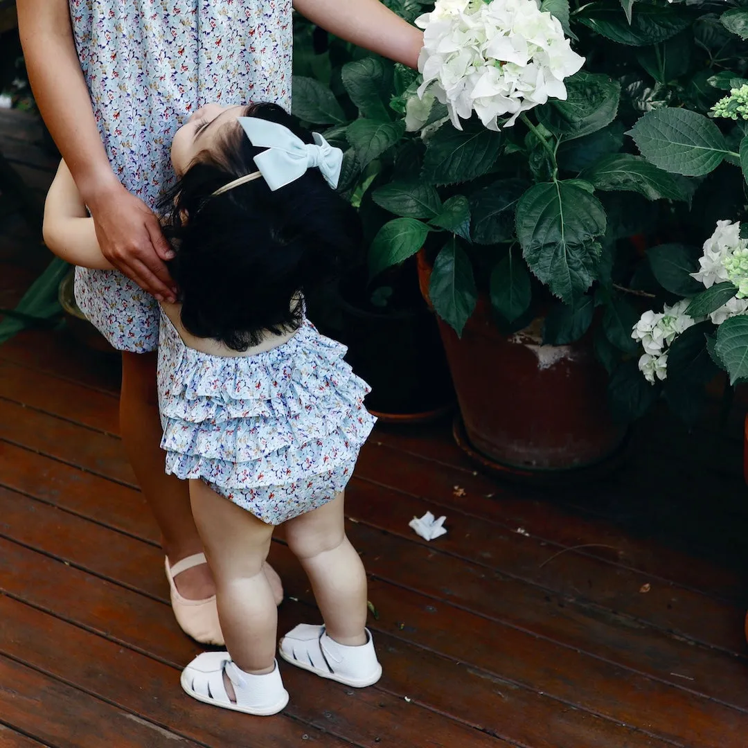 ruffle romper - delphinium floral