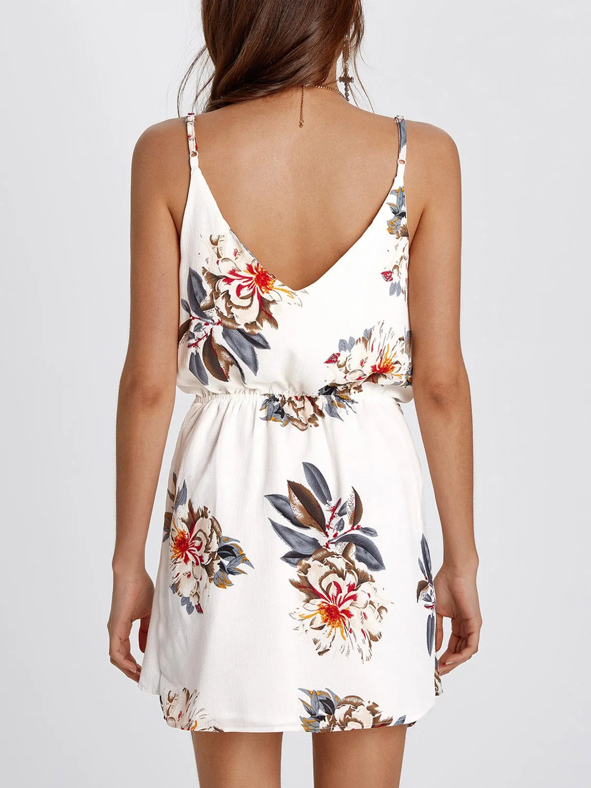 Wholesale Round Neck Sleeveless Floral Print Tiered Backless Spaghetti Strap Self-Tie Curved Hem Dresses